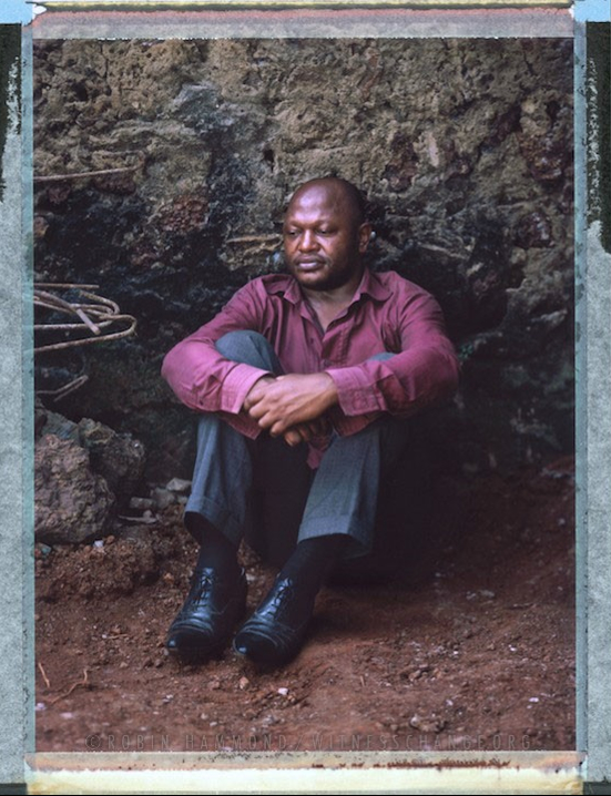 A posed portrait of 41 year old Marc Lambert Lamba. In May 2005 Marc was arrested at a bar in Cameroon’s capital Yaounde along with nearly 40 others. Many were able to bribe their way out of the police station, the remaining 11, of which Lambert was one, were put in prison. They spent 12 months awaiting trial. In the end seven of the 11 were charged with the crime of homosexuality and sentenced to seven months in prison. They had already served their time awaiting trial so were released. Lambert says,  “it was a nightmare for me but I transformed this nightmare into an opportunity – it gave me the chance to denounce to the international community the situation of discrimination against people in my country for their sexual orientation or gender identity. Thanks to that a LGBT movement was born in Cameroon”. Lambert took the Cameroonian Government to the Working Group on Arbitrary Detention at The United Nations and won his case. The Cameroonian Government ignored the verdict. Yaounde, Cameroon. December 2014.  While many countries around the world are legally recognizing same-sex relationships, individuals in nearly 80 countries face criminal sanctions for private consensual relations with another adult of the same sex. Violence and discrimination based on sexual orientation or gender expression is even more widespread. Africa is becoming the worst continent for Lesbian, Gay, Bi-sexual, Transgender, Queer, Inter-sex (LGBTQI) individuals. More than two thirds of African countries have laws criminalizing consensual same-sex acts. In some, homosexuality is punishable by death. In Nigeria new homophobic laws introduced in 2013 led to dramatic increase in attacks. Under Sharia Law, homosexuality is punishable by death, up to 50 lashes and six months in prison for woman; for men elsewhere, up to 14 years in prison. Same sex acts are illegal in Uganda. A discriminatory law was passed then struck down and homophobic attacks rose tenfold after the passage of the Anti-Homosexuality Act. In Cameroon it is also illegal. More cases against suspected homosexuals are brought here than any other African country. In stark contrast with the rest of the continent, same sex relationships are legal in South Africa. The country has the most liberal laws toward gays and lesbians on the continent, with a constitution guaranteeing LBGTQI rights. Because of this, LGBTQI Africans from all over the continent fleeing persecution have come to South Africa. Despite these laws, many lesbians have been victims of ‘corrective rape’ and homosexuals have been murdered for their sexuality. Homophobia is by no means just an African problem. In Russia, politicians spread intolerance. In June 2013 the country passed a law making “propaganda” about “non-traditional sexual relationships” a crime. Attacks against gays rose. Videos of gay men being tortured have been posted online. In predominantly Muslim Malaysia, law currently provides for whipping and up to a 20-year prison sentence for homosexual acts involving either men or women. Increased extreme Islamification in the Middle East is making life more dangerous for gay men there, as evidenced by ISIS’s recent murders of homosexual men. While homophobic discrimination is widespread in Lebanon, life is much safer there than Iran, Iraq, and Syria from which refugees are fleeing due to homophobic persecution. Photo Robin Hammond/Panos for Witness Change