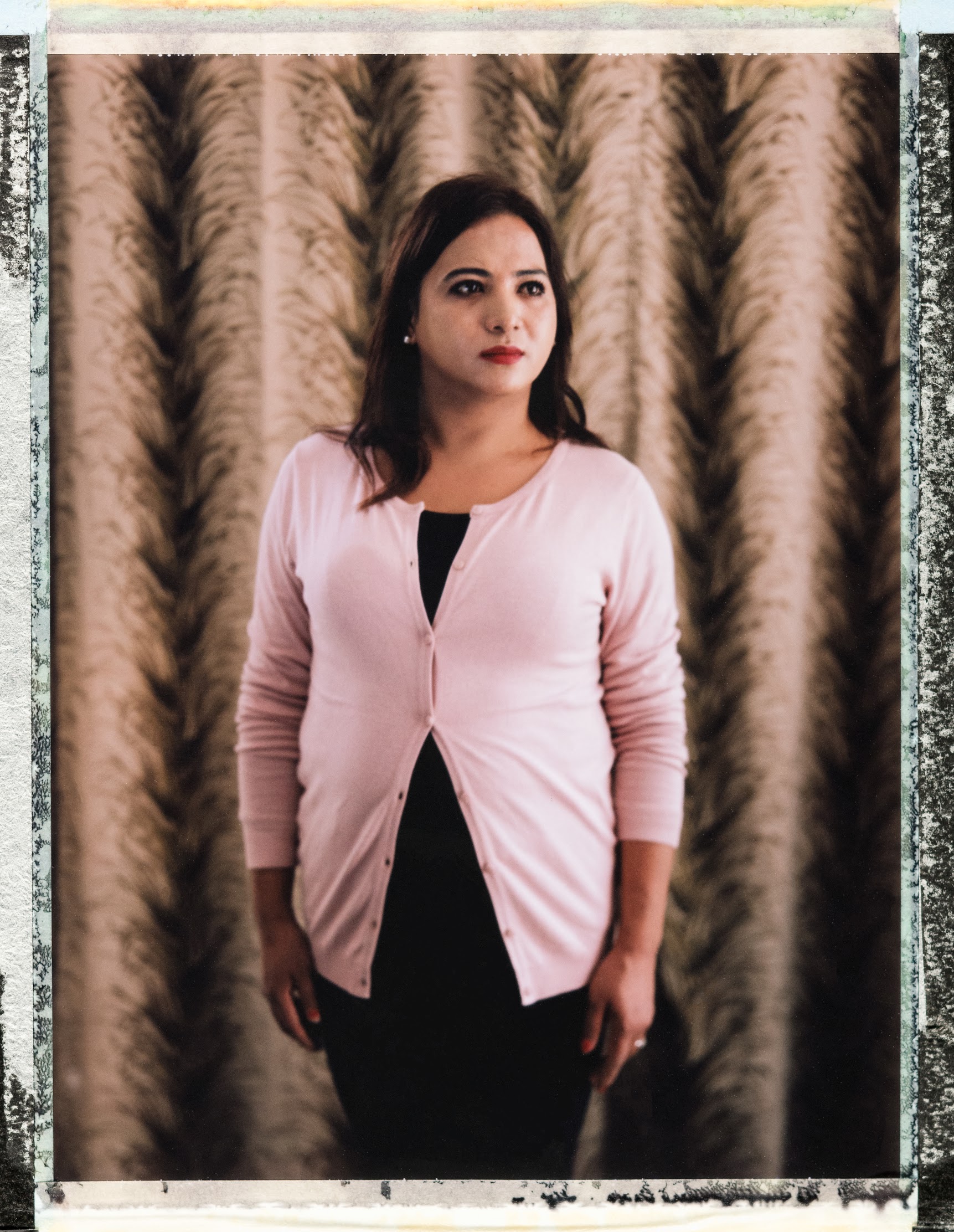 “I was born as a boy but my feeling was a girl,” says 32 year old Simran Sherchan, a trans woman and now National Program Co-ordinator for The Federation of Sexual and Gender Minorities, Nepal. As a child, with no exposure to open LGBTQI+ individuals or educational materials, she was confused about who she was. She then thought she was gay, until at 19, she read about transgender women: “When I realized I was trans - that was the happiest moment in my life. I realized I was not alone.” Simran’s family though wanted her to marry. ”I hid myself in Kathmandu so they couldn’t force me to marry her.” Without a job and family support, Simran descended into poverty. “I had to do sex work for money. For 6 or 7 months. When I was doing that I saw a lot of violence and problems. I really didn’t want to do sex work but I didn’t have other options.” Her experience on the street led her to Blue Diamond Society, a LGBTI organisation in Kathmandu. They offered her a job as an outreach worker. “I left sex work and started my new life. Now i go everywhere for the LGBT community.” When asked what she wants for the future she says “I hope people will accept LGBTI people more now. If we stay in the dark side nobody can see us, we must come into the light show the people that we exist, we are also beautiful.” Nepal's current LGBTQI+ laws are some of the most open in the world – including the legal recognition of a third gender. Tangible implementation of the various government orders has been piecemeal though, a 2014 United Nations report noted. And government officials have continued to harass LGBT groups, including by alleging that organizing around homosexuality is illegal in the country. Furthermore, while laws are progressive, discrimination is wide spread, especially within families, where marriage between a man and a woman and the bearing of children are expected of young Nepalese. Katmandu, Nepal. 30 October 2018. Photo Robin Hammond/Witness Change