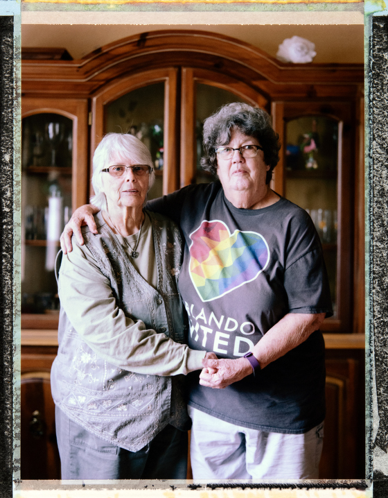 74 year-old, Anglo, bisexual woman Sharon Durrant (right) at home in Orlando with her wife 82 year-old, Anglo Saxon , bisexual woman Ellen Hone (left). Both were previously married to men. They attend First Unitarian Church. Behind the scenes photography and video and assistant: Juan Pablo Ampudia, juanpablo@cuartocreativo.com. Phone +52 1 55 8676 5741. Photography by Robin Hammond, pitures@robinhammond.co.uk. Editor: Mallory Benedict, Mallory.Benedict@natgeo.com, +1 202.791.1282. 24 March 2019